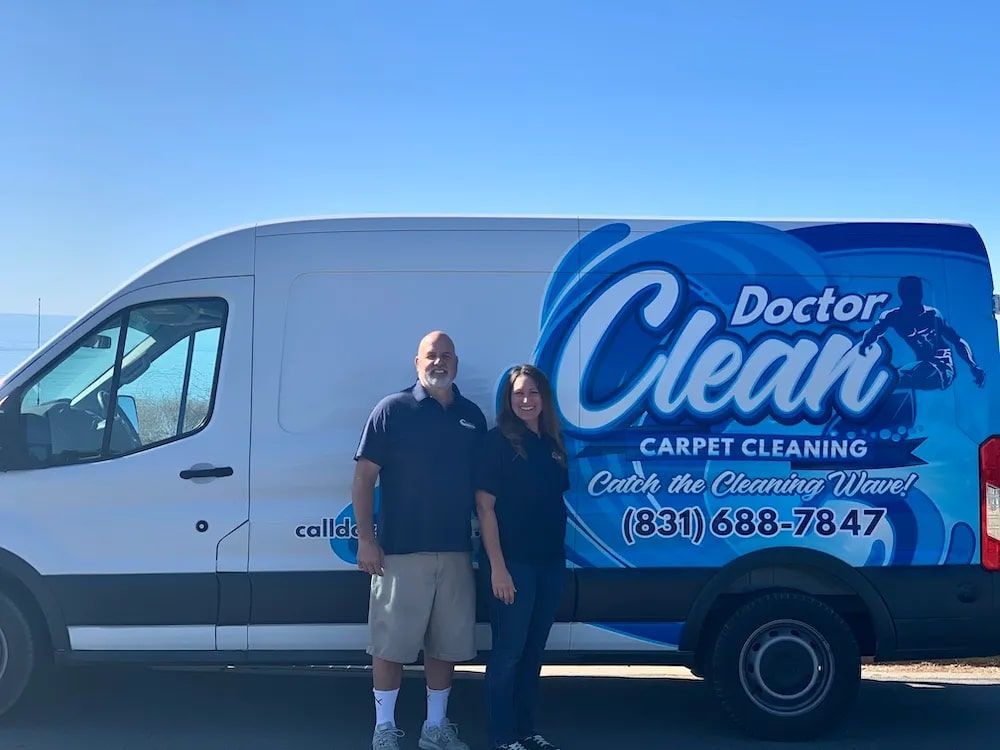 Jeff and Angela, owners of Doctor Clean, in front of their van